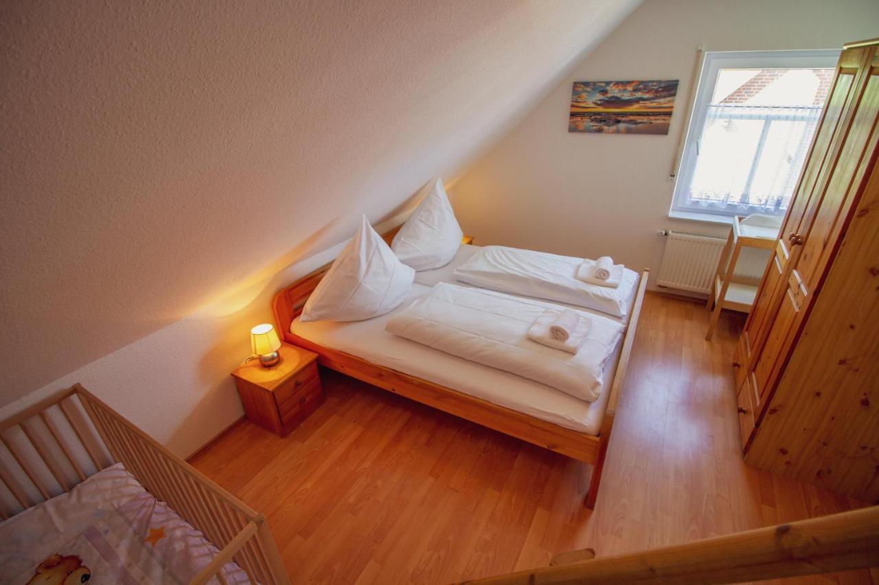 Haus Leuchtturm - Flut Apartment ครุมเฮิร์น ภายนอก รูปภาพ