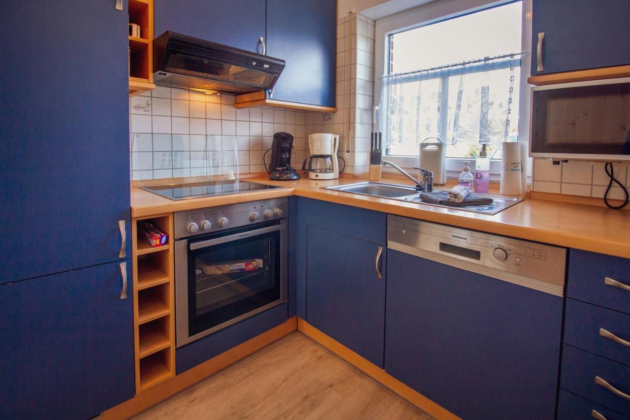 Haus Leuchtturm - Flut Apartment ครุมเฮิร์น ภายนอก รูปภาพ