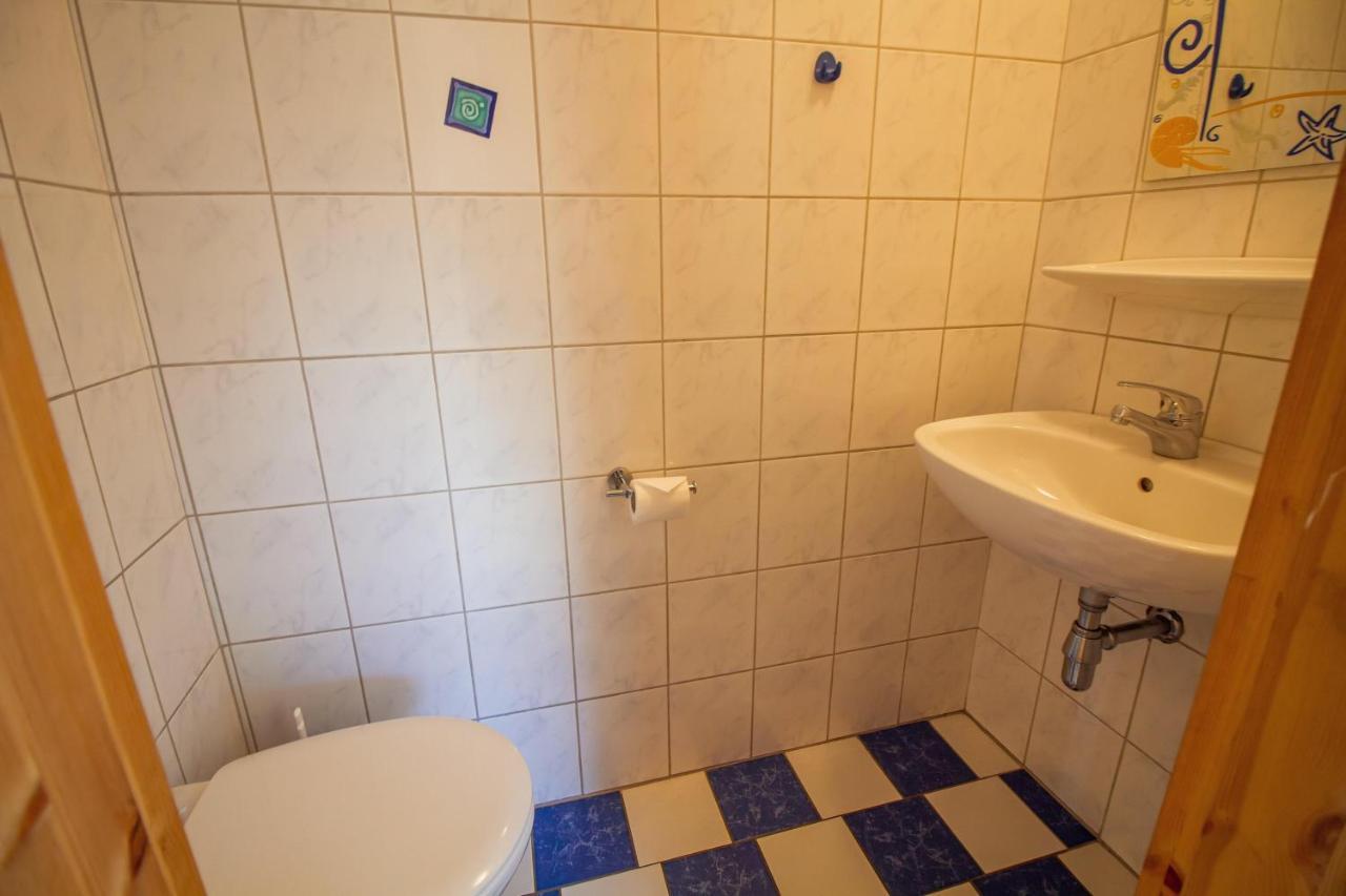 Haus Leuchtturm - Flut Apartment ครุมเฮิร์น ภายนอก รูปภาพ