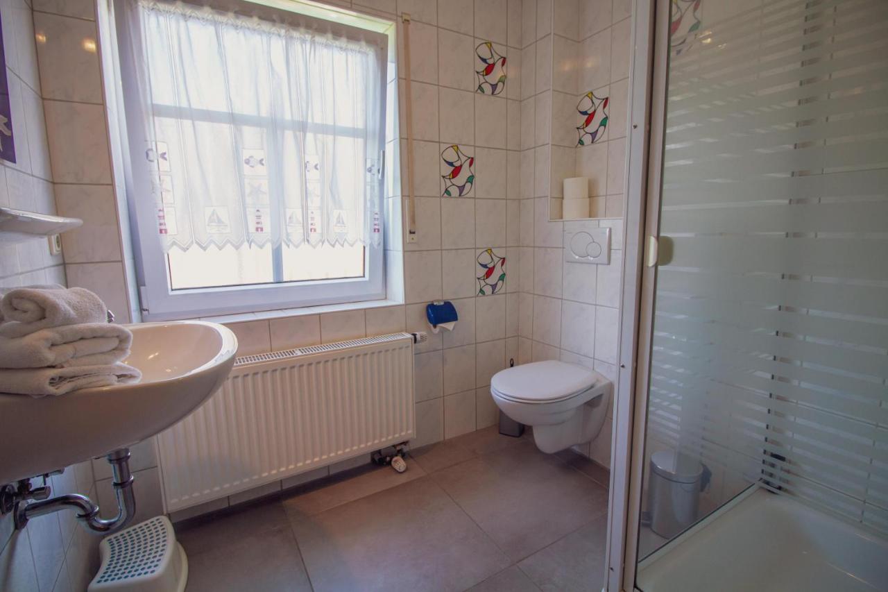 Haus Leuchtturm - Flut Apartment ครุมเฮิร์น ภายนอก รูปภาพ